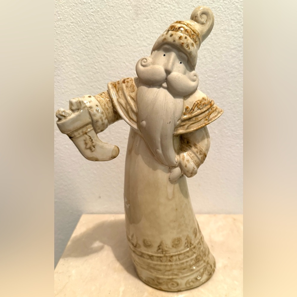 Porcelain Santa figurine 12”.